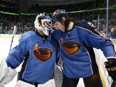 If Chris Mason (left) and the Thrashers have any hope to reach the postseason, they will have to win out. (Getty Images)