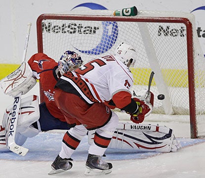 Tuomo Ruutu goes backhand on goalie Semyon Varlamov for what is the deciding goal in the shootout. (Getty Images)