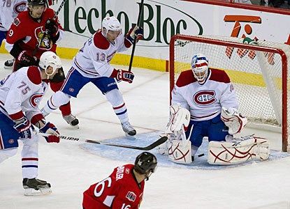 Bobby Butler, who has a hand in every Ottawa goal, beats Alex Auld five-hole with a snap shot. (US Presswire)