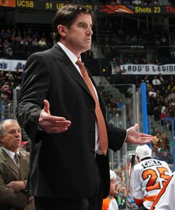 Flyers coach Peter Laviolette is keeping quiet about who his starting goalie will be in Game 3. (Getty Images)