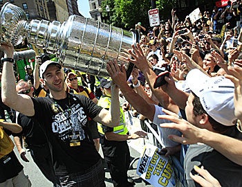 Bruins captain Zdeno Chara hoists the Cup, the franchise's first since 1972. (AP)