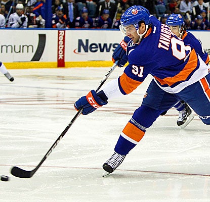 John Tavares scores two goals and two assists in the first period against the Lightning. (US Presswire)
