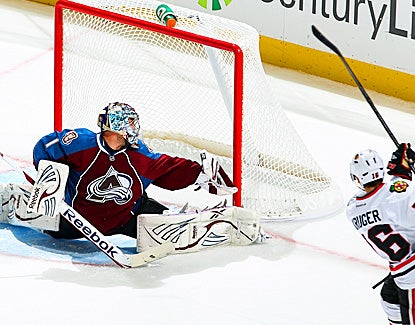Semyon Varlamov turns away 34 shots through overtime and also stops three players in the shootout. (Getty Images)