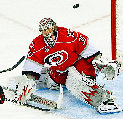 Cam Ward collects his first shutout since he kept the Red Wings off the board last April. (AP)
