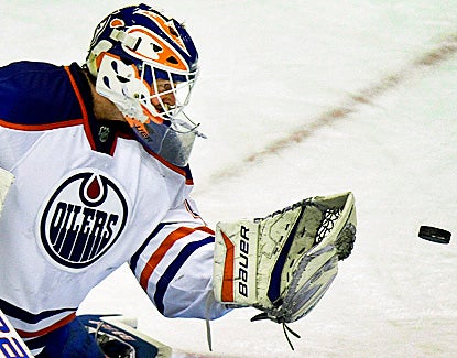 Devan Dubnyk comes up with a season-high 40 saves to help Edmonton win its fourth straight game. (AP)