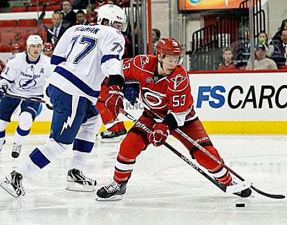 Jeff Skinner (right), last season's NHL Rookie of the Year, scores two goals in the Hurricanes' victory over the Lightning. (AP)