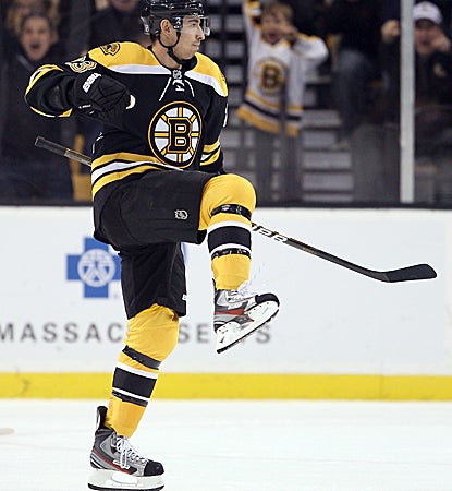Chris Kelly scores a goal and adds an assist to help the defending Stanley Cup champs snap their three-game skid. (Getty Images)