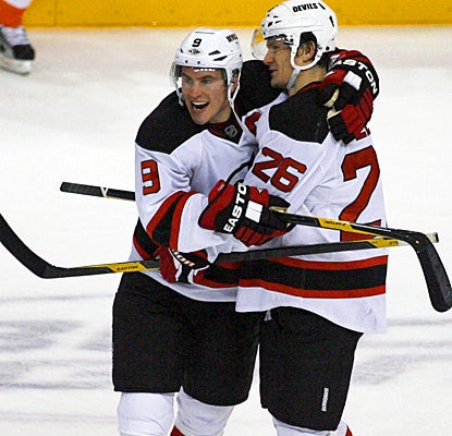New Jersey's Patrik Elias (right) celebrates with Zach Parise after scoring a shootout goal. (AP)