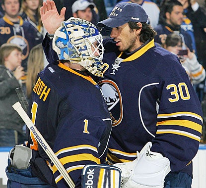Even though Ryan Miller (30) was replaced by Jonas Enroth (1) in the Buffalo net, Miller gives Enroth props for his effort. (Getty Images)