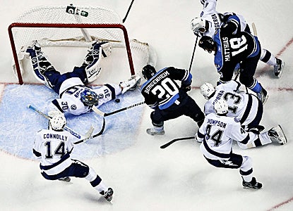 Goalie Dwayne Roloson turns away all 29 shots he faces after coming off the bench late in the first period. (Getty Images)