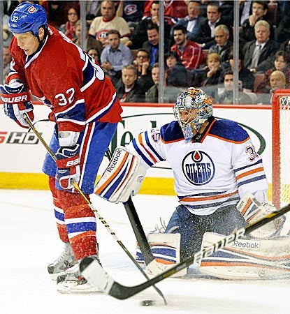 Nikolai Khabibulin's stellar first month of the season continues with a 28-save victory in Montreal.  (Getty Images)