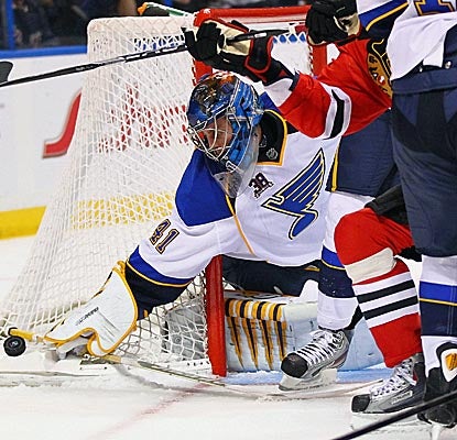 Jaroslav Halak makes 29 saves to shut out the Blackhawks and earn Ken Hitchcock his first win with the Blues. (Getty Images)