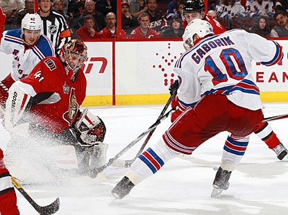 Marian Gaborik scores the first goal for the Rangers and the third to extend his point streak to four games. (AP)