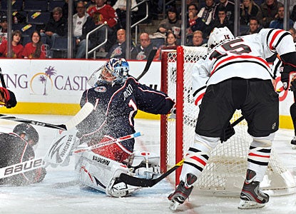 Andrew Brunette shoves the puck past Steve Mason on a power play to open up the second period. (Getty Images)