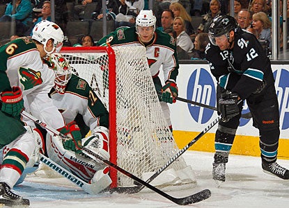 Patrick Marleau (12) scores two power-play goals to record his 52nd career multigoal game. (Getty Images)