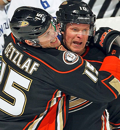 Corey Perry (right) celebrates one of two goals on the power play in the second period. (Getty Images)