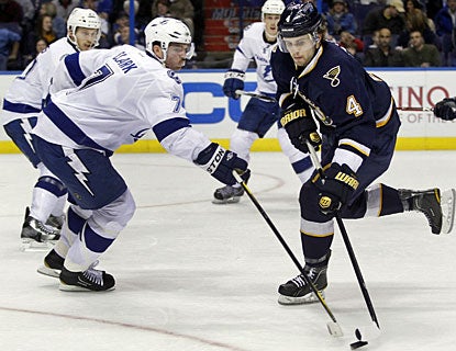 Kris Russell, who was acquired from the Blue Jackets on Friday, shows his skills for the Blues right away. (AP)