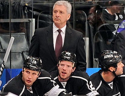 Terry Murray sits behind the bench in an NHL regular-season game for the 1,000th time in his career. (Getty Images)
