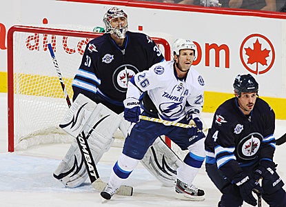 Goalie Ondrej Pavelec sends back 30 saves to help the Jets rout the Bolts at home. (Getty Images)