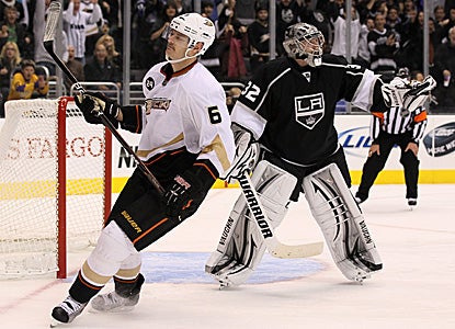 Jonathan Quick (right) sends away a lot of disappointed Ducks with 23 saves in regulation, and 6 out of 7 in the shootout. (Getty Images)