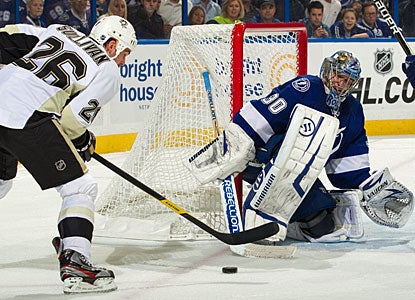 Just like in last season's playoffs, Dwayne Roloson keeps the Penguins in check once again. (Getty Images)