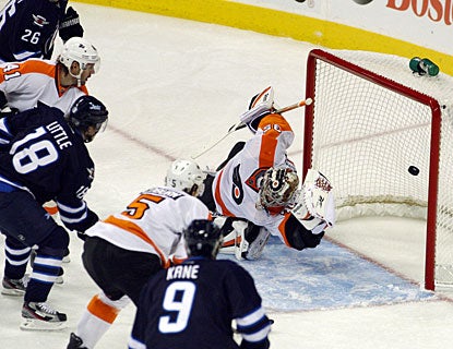 Bryan Little scores two goals in the first period to help the Jets win for the third straight time on home ice. (US Presswire)
