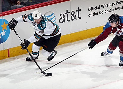 Patrick Marleau (left) explodes for a hat trick against the Avs, including two goals in the second period. (Getty Images)