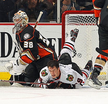 Chicago's Jonathan Toews loses his helmet after scoring his second goal against Anaheim. (Getty Images)
