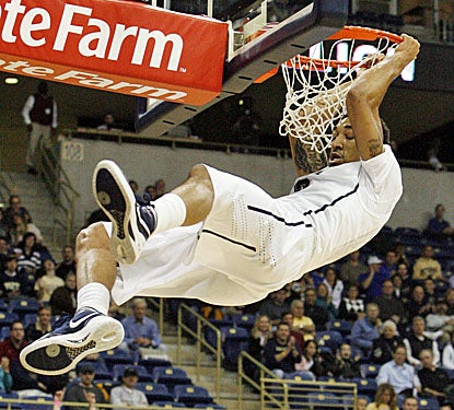 Cameron Wright adds a career-high 13 points to the Panthers' win over the Colonials. (US Presswire)