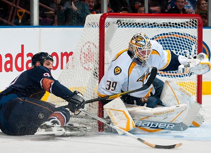 Anders Lindback plays through an injury to earn his first win of the season for Nashville. (Getty Images)