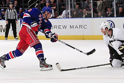Brad Richards follow through on his shot for the Rangers' third of four goals in the second period. (AP)