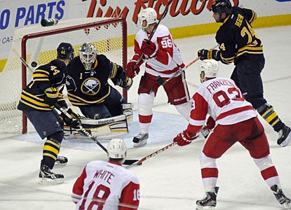 Johan Franzen is one of three scorers for Detroit in the first period as he tallies from the slot. (AP)