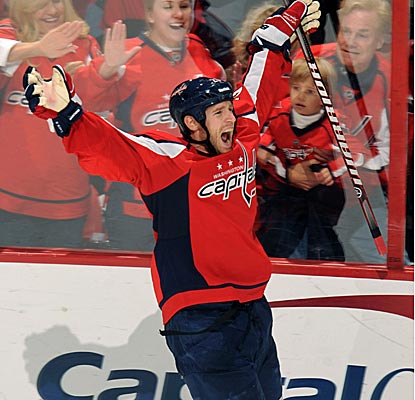 Washington's Brooks Laich scores the game-winning goal 12 seconds into OT in his 500th career game. (Getty Images)
