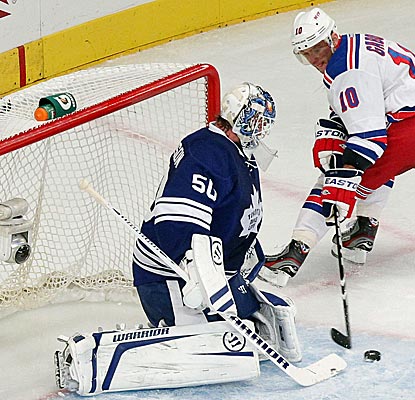 Jonas Gustavsson's 30 saves help Toronto stop the Rangers' five-game win streak. (US Presswire)