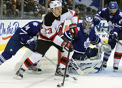 David Clarkson scores on the power play in the first period, then helps the Devils with the winner in overtime. (US Presswire)