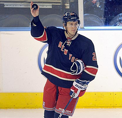 New York's Derek Stepan takes a curtain call after notching three points, including a pair of goals.  (AP)