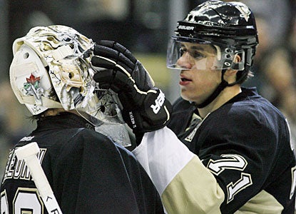 Marc-Andre Fleury gets it done at one end while Evgeni Malkin at the other with his seventh career hat trick. (US Presswire)