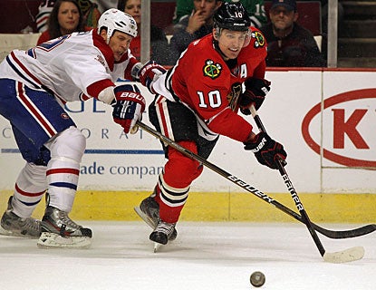 Patrick Sharp's 18th goal of the season breaks a 1-1 tie and the Blackhawks never look back thereafter. (Getty Images)