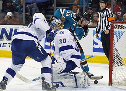 Logan Couture contributes with two goals for the fastest five goals for the Sharks in a regular-season game. (US Presswire)