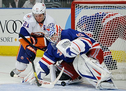 Martin Biron makes 24 saves and also assists on Brandon Dubinsky's goal. Biron has two assists this season. (AP)