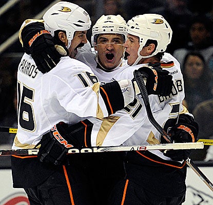 Luca Sbisa (middle) scores one of Anaheim's three goals in its victory against San Jose. (Getty Images)