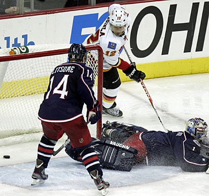 Jarome Iginla scores here in the third period to even the game, then follows it up with the only goal in the shootout. (AP)