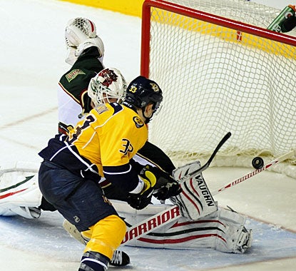 Colin Wilson takes care of business and is the only one to convert the shootout try for the win. (AP)