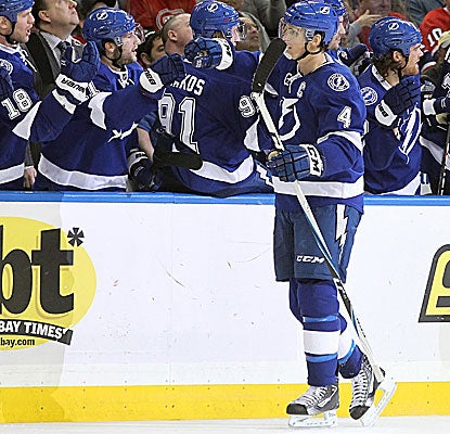 Vincent Lecavalier (4) puts Tampa Bay ahead for good midway through the third period with a rebound goal. (US Presswire)