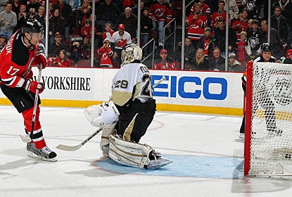 Ilya Kovalchuk makes no mistake on a penalty shot and also gets assists on the two other New Jersey goals. (Getty Images)