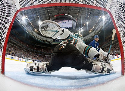 Antti Niemi stops Cody Hodgson in the SO to help San Jose beat Vancouver for the first time this season. (Getty Images)