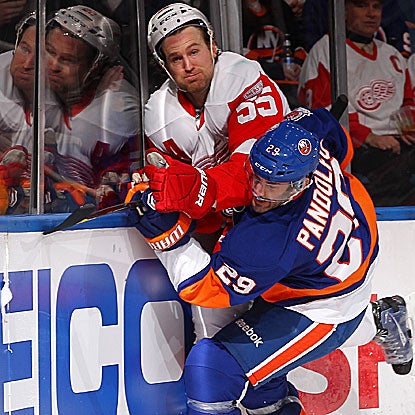 Jay Pandolfo (right) and the Islanders improve to 5-0-1 against the Red Wings since the lockout.  (Getty Images)