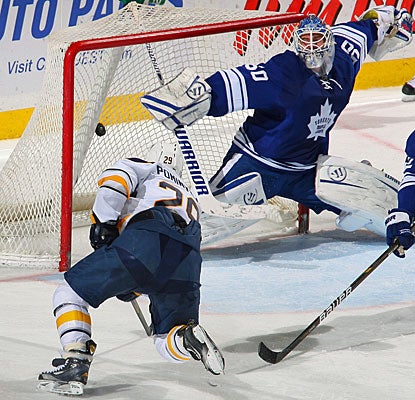 Jason Pominville snaps a shot past Jonas Gustavsson for his 15th goal of the season. (Getty Images)
