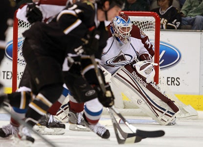 The Avs' Jean-Sebastien Giguere sends back 21 shots to help Colorado improve to 50 points on the season. (Getty Images)