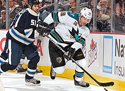 Patrick Marleau's goal with 2:57 remaining snaps a 1-1 tie and improves the Sharks to 6-0-2 in their last eight games.  (Getty Images)
